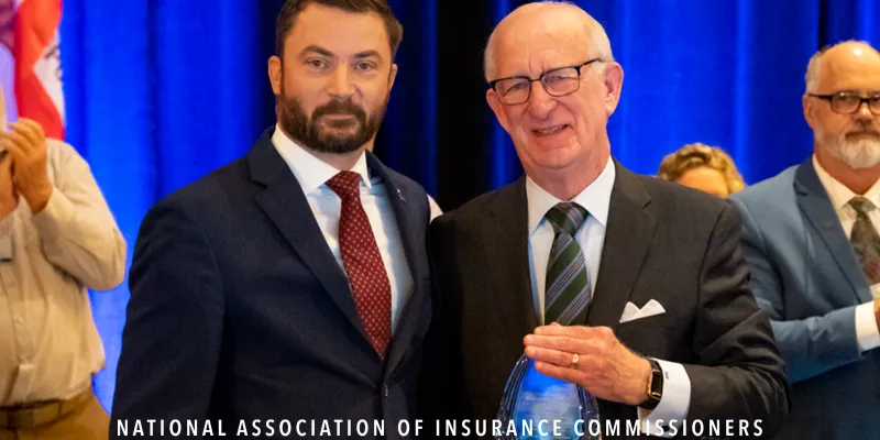 David Altmaier presenting Ray Farmer with President's Award