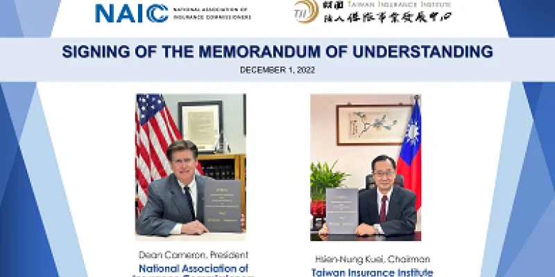 Picture of NAIC President and Idaho Department of Insurance Director Dean L. Cameron and Taiwan Insurance Institute Chairman Hsien-Nung Kuei with the signed Memorandum of Understanding