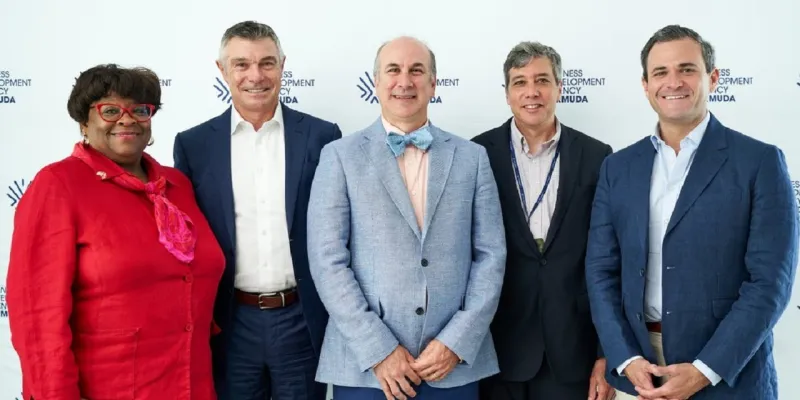 NAIC President Chlora Lindley-Myers standing with 4 other people at the Bermuda Climate Summit 2023