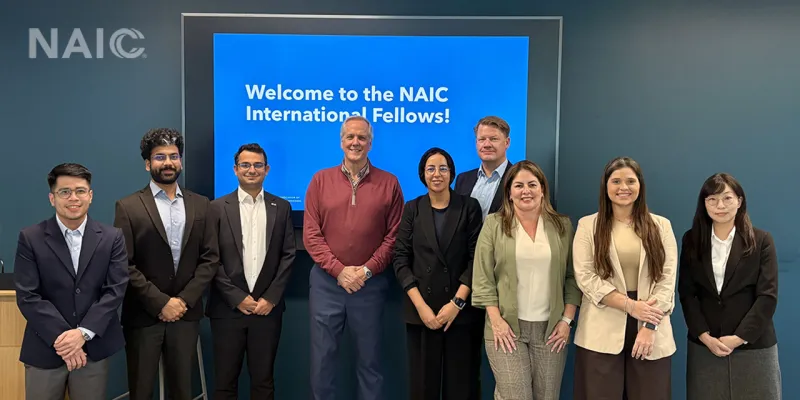 NAIC CEO Jeff Johnston with 2026 Fall International Fellows Program participants