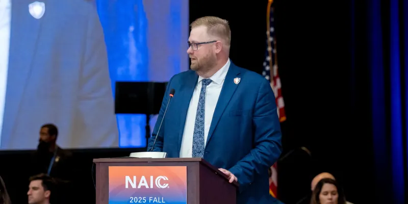 North Dakota Insurance Commissioner and NAIC President Jon Godfread delivers the keynote address at the NAIC 2025 Fall National Meeting.